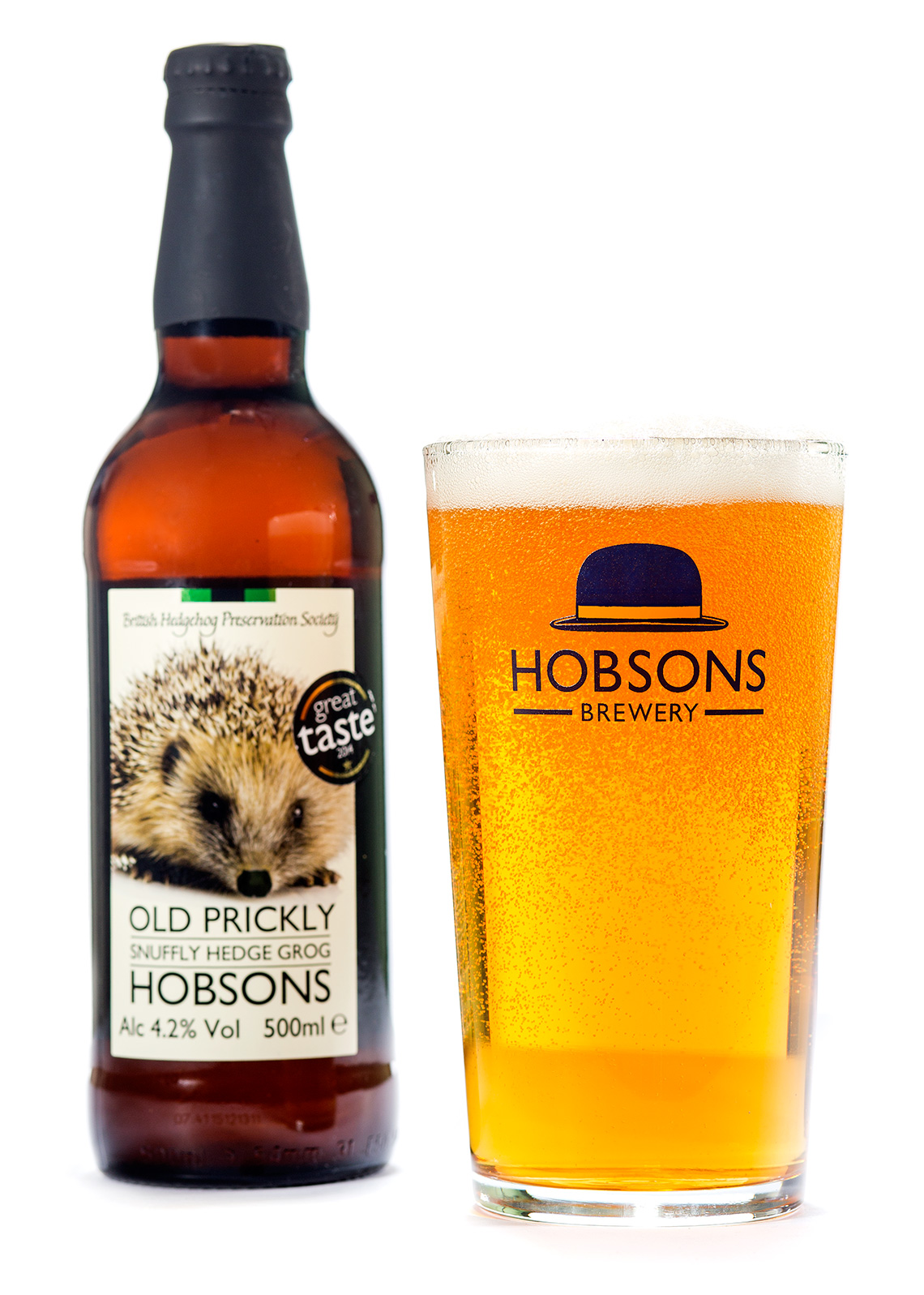 Commercial studio product photography of a pint and bottle of Hobsons Old Prickly Snuffly Hedge Grog.