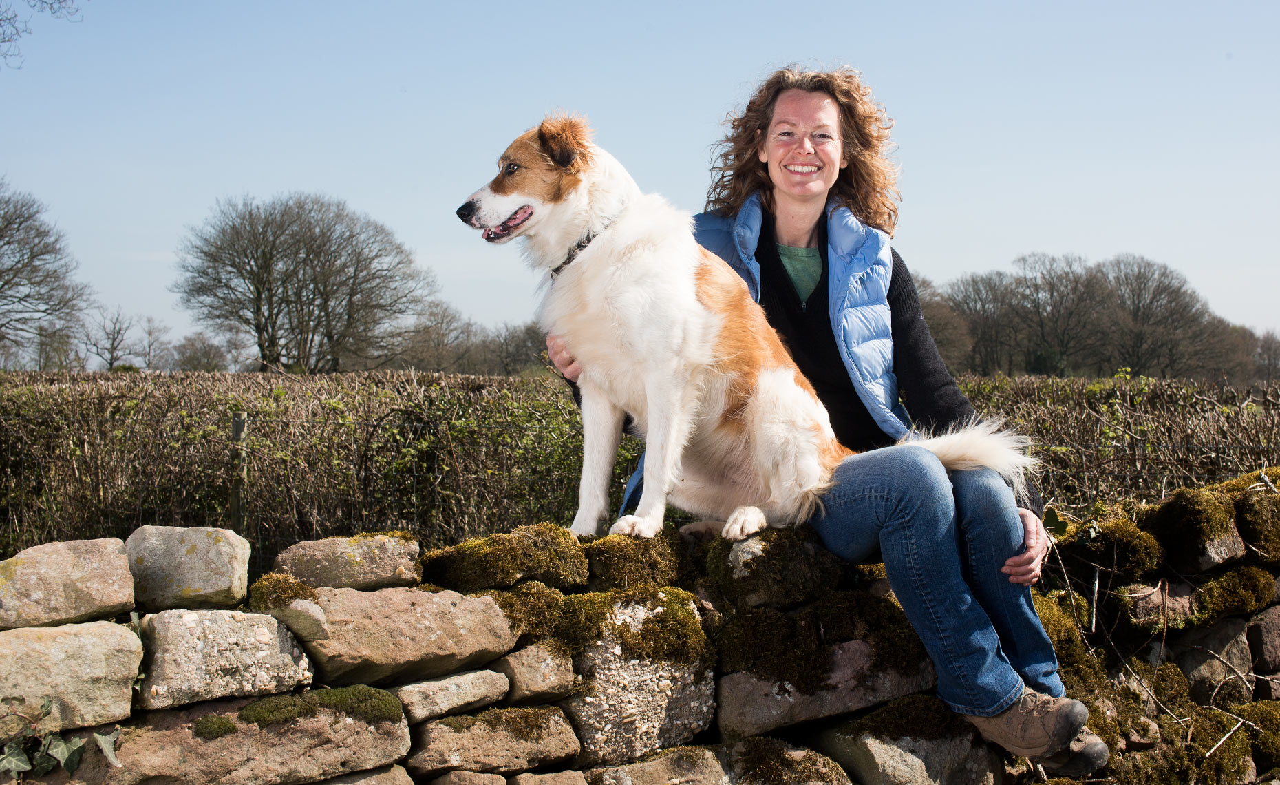 Environmental editorial portrait of Television presenter, Kate Humble with her Welsh sheepdog Teg.