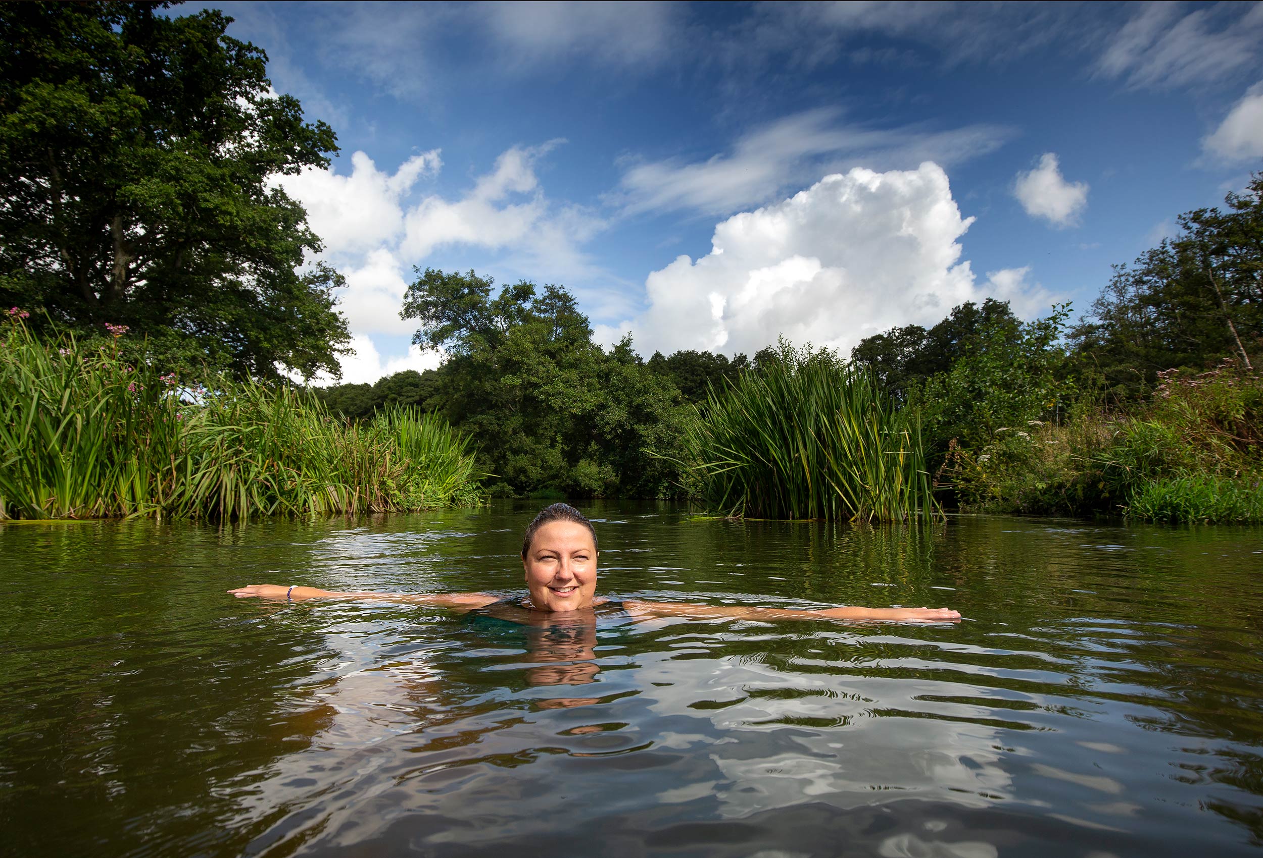 Wild Swimming with Ella Foote of Dip Advisor an outdoor swim guiding company. Editorial Portrait for Gridline magazine.