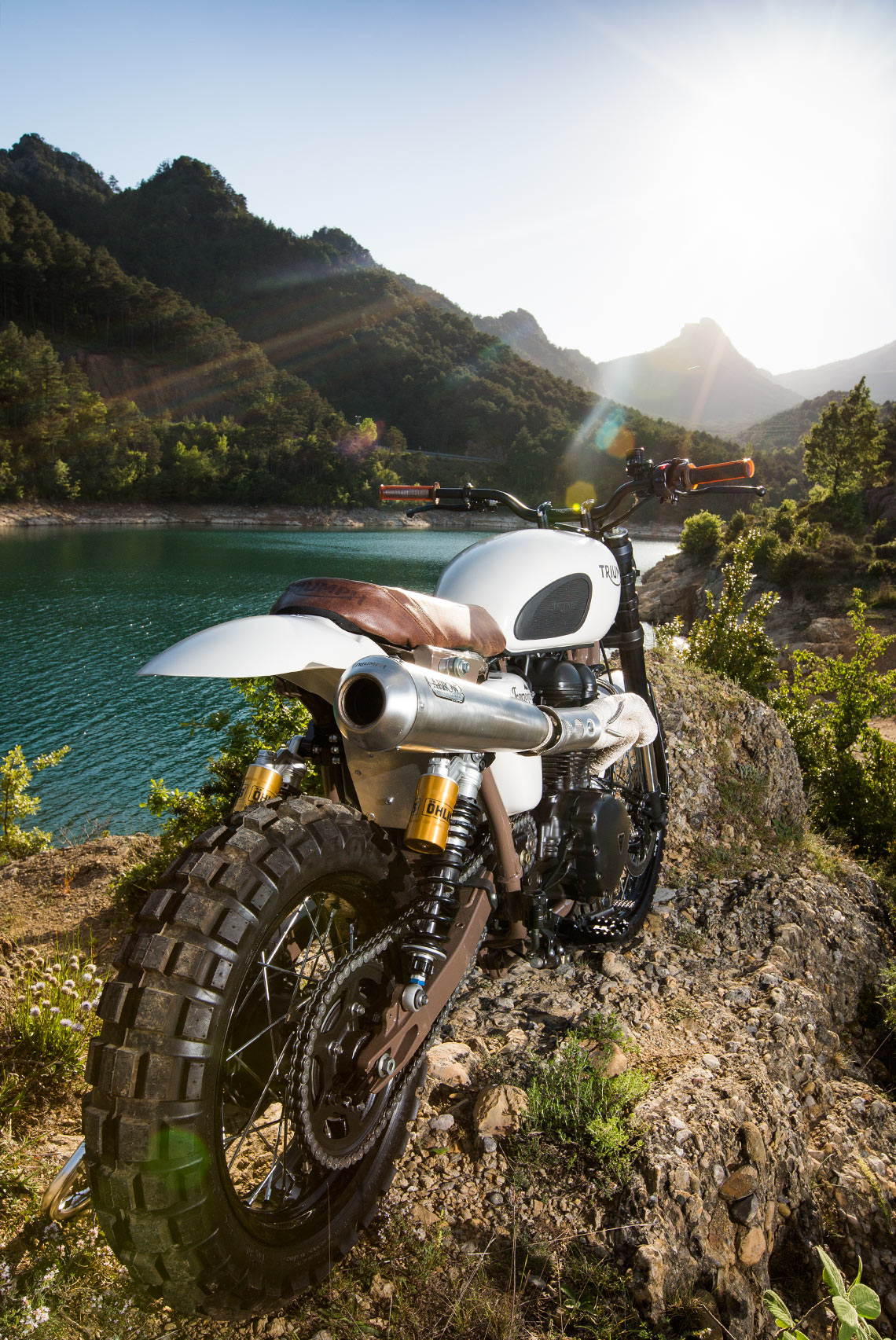 Editorial features photography of a custom Triumph scrambler in the Pyrenees.