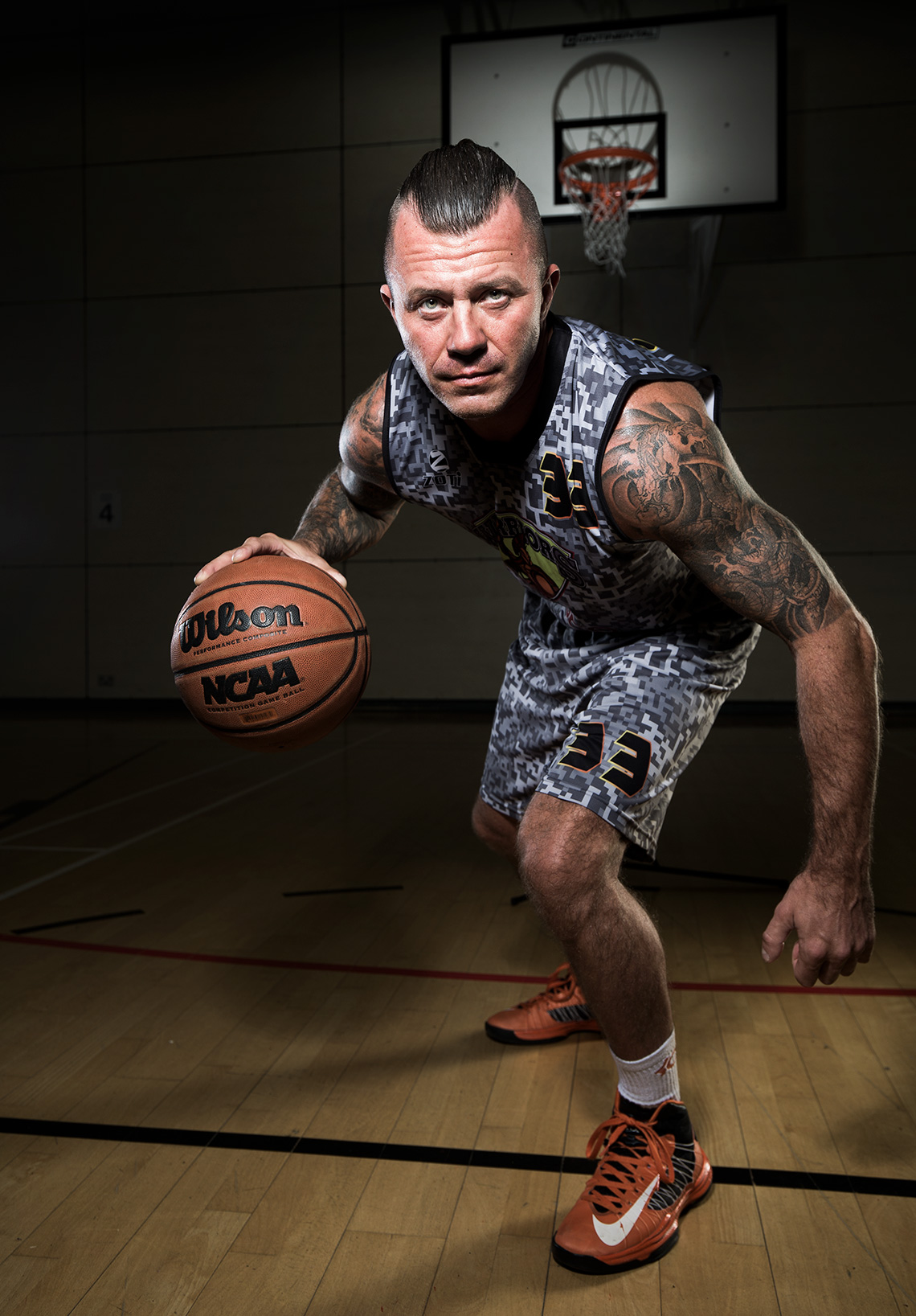 Goole warriors basketball player practicing on court shot for an editorial feature.